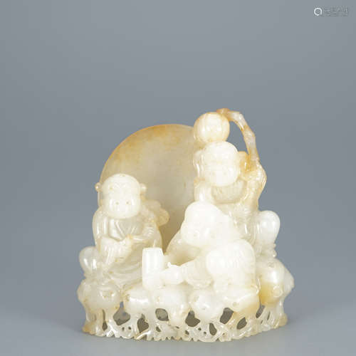 A Carved White Jade Boy Ornament