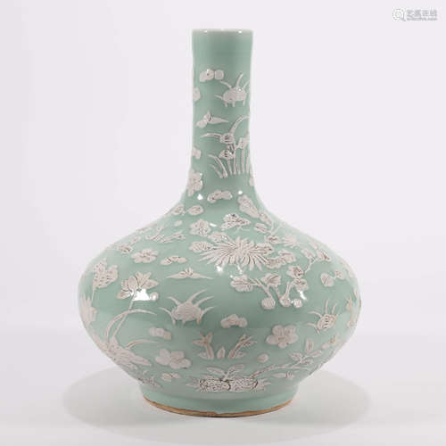 A Celadon Glaze and White Applique Floral Bottle Vase