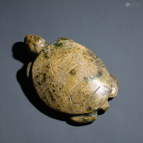 A Carved Chicken Bone Jade Turtle Ornament