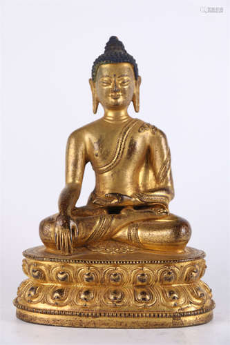 A Gilt Copper Sakyamuni Buddha Statue.