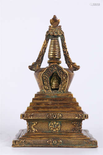 A Gilt Copper Buddhist Stupa.