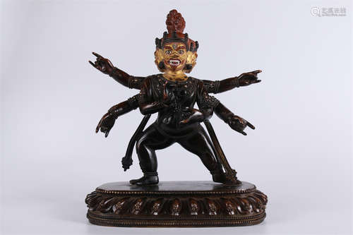 A Copper Six-Arm Mahakala Buddha Statue.