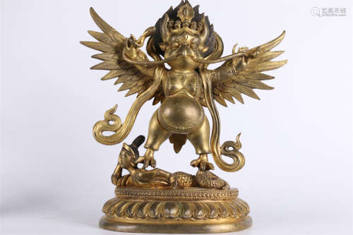 A Gilt Copper Garuda Buddha Statue.