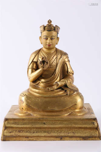 A Gilt Copper Guru Buddha Statue.