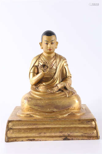 A Gilt Copper Guru Buddha Statue.