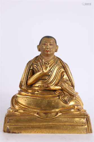 A Gilt Copper Guru Buddha Statue.