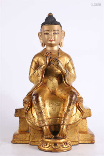 A Gilt Copper Sakyamuni Buddha Statue.