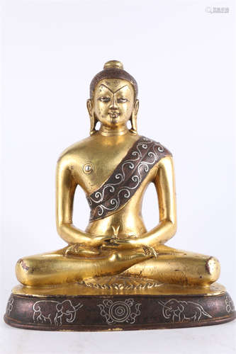 A Gilt Copper Sakyamuni Buddha Statue.