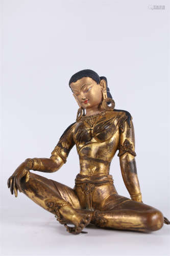 A Gilt Copper Guanyin Bodhisattva Statue.