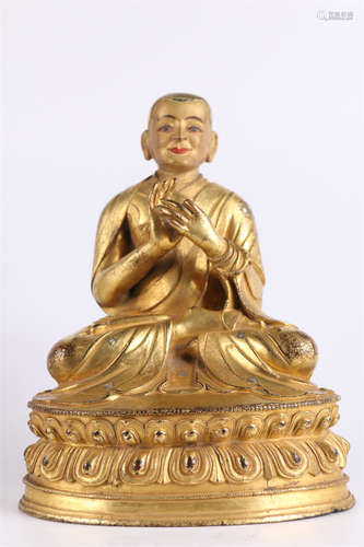 A Gilt Copper Guru Buddha Statue.