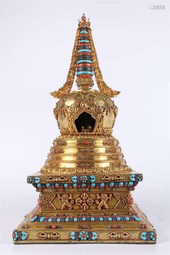 A Gilt Copper Buddhist Stupa.