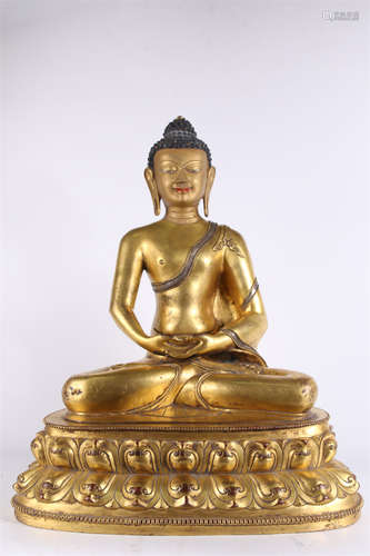 A Gilt Copper Sakyamuni Buddha Statue.