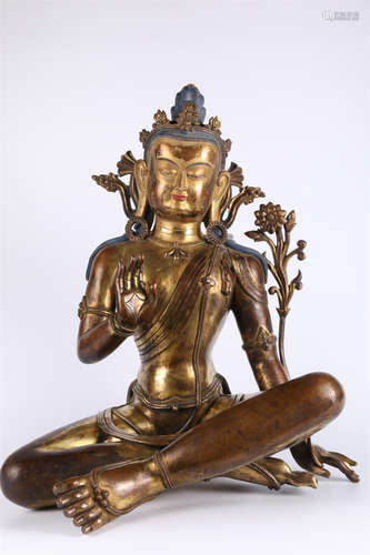 A Gilt Copper Guanyin Bodhisattva Statue.