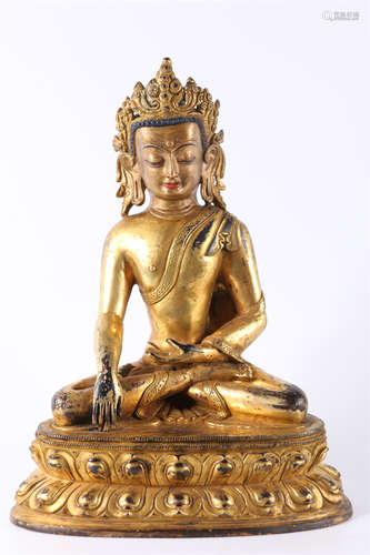 A Gilt Copper Maitreya Buddha Statue.