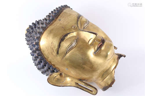 A Sakyamuni Buddha's Head Sculpture.