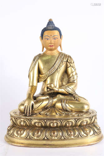 A Gilt Copper Bhaisajyaguru Buddha Statue.