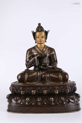 A Copper Guru Buddha Statue.