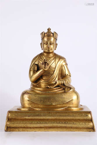 A Gilt Copper Guru Buddha Statue.