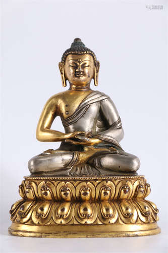 A Gilt Copper Sakyamuni Buddha Statue.