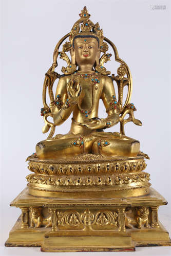 A Gilt Copper Acalanatha Buddha Statue.