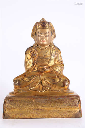 A Gilt Copper Guru Buddha Statue.