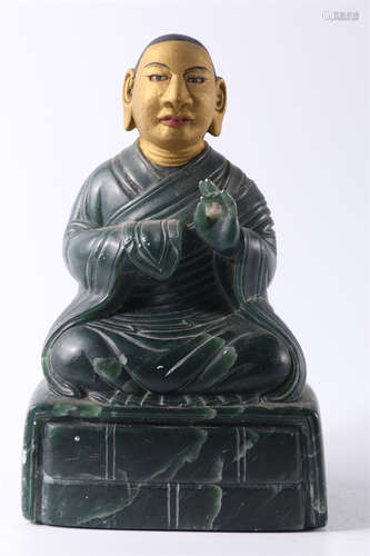 A Hetian Jasper Guru Buddha Statue.