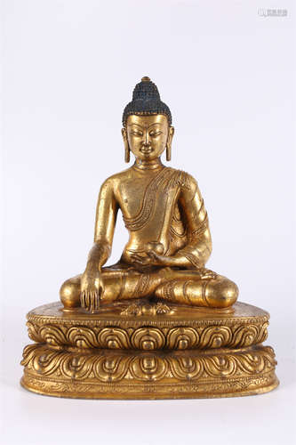 A Gilt Copper Bhaisajyaguru Buddha Statue.