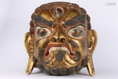 A Gilt Copper Buddha's Head Sculpture.