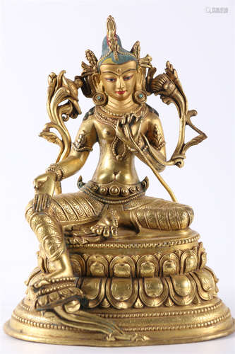 A Gilt Copper Green Tara Buddha Statue.