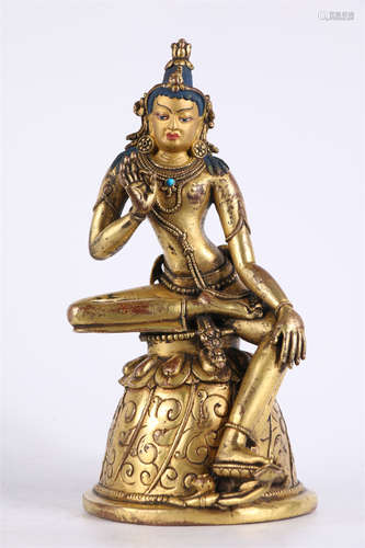 A Gilt Copper Avalokitesvara Statue.