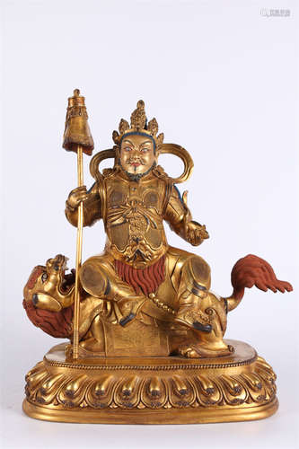 A Gilt Copper Vaisravana Buddha Statue.