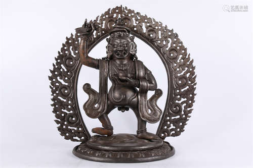 A Cast Iron Mahakala Buddha Statue.