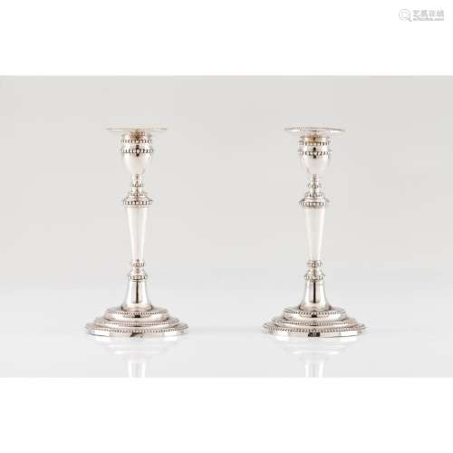 A pair of D.Maria candlesticks