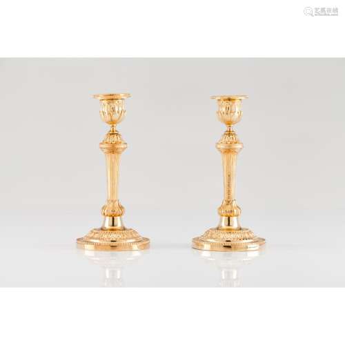 A pair of Louis XVI candlesticks