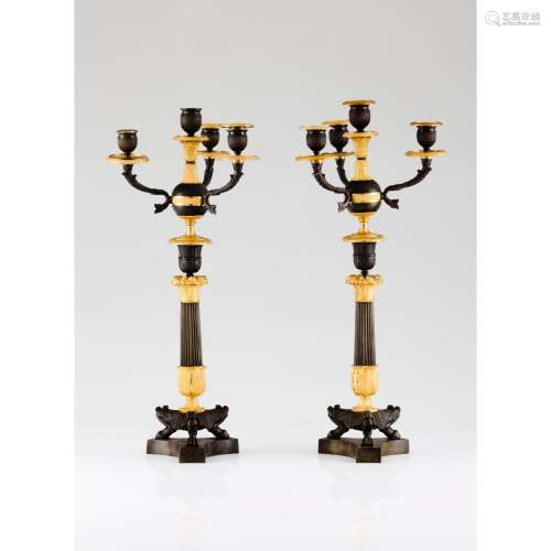 A Louis XVIII period pair of convertible candlesticks