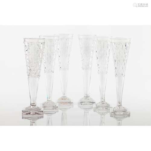 A set of 6 cut crystal champagne flutes