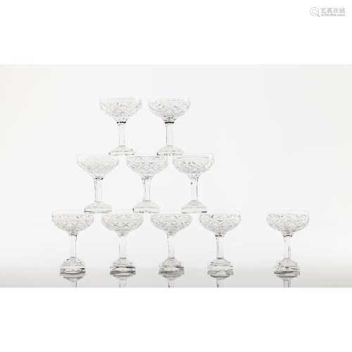 A set of 12 cut crystal Champagne glasses