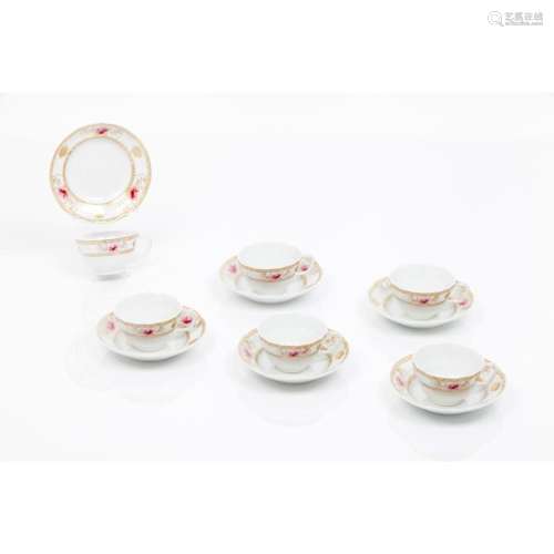 A set of 6 cups and saucers