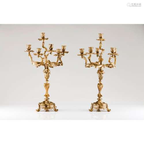 A pair of Rococo style six branch candelabra