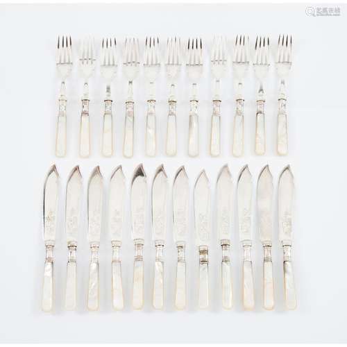 A set of 12 fish forks and 11 fish knives