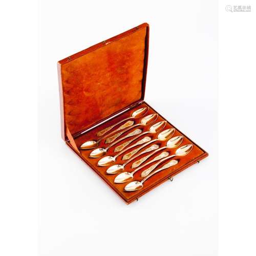 A set of 12 Louis XV style jam spoons