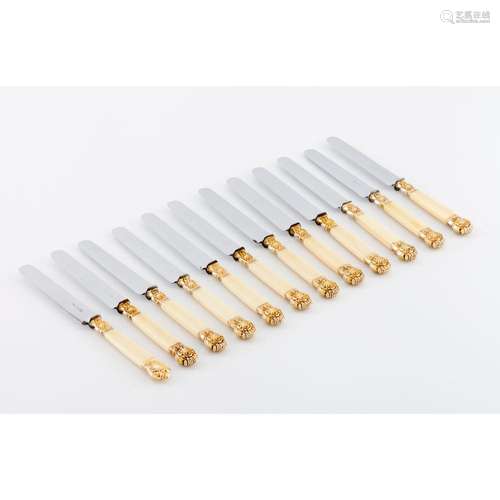 A set of 12 cheese knives