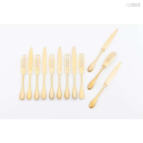 A Louis XVI style set of melon knives and forks