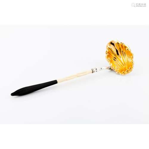 A Rococo style punch ladle