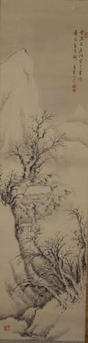 Chinese ink painting on paper scroll of snow mountain scene.