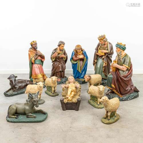 A complete and large figurative Nativity scene made of patin...