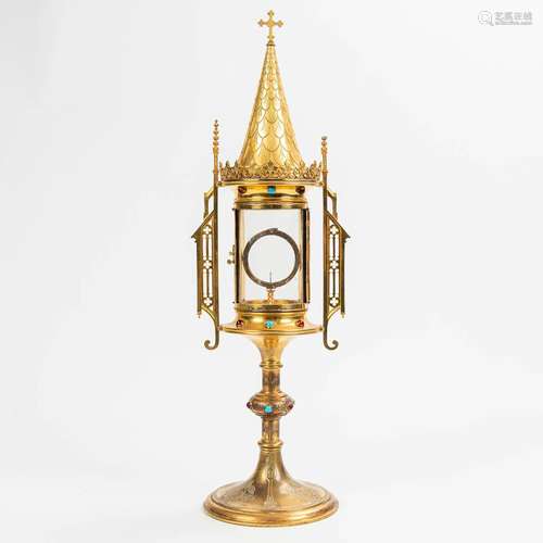 A monstrance, made of brass and glass in neogothic style