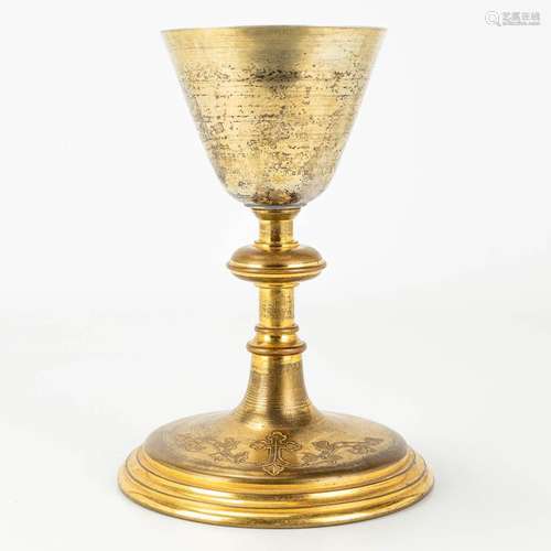 A gilt neogotich chalice, made of gold-plated brass.