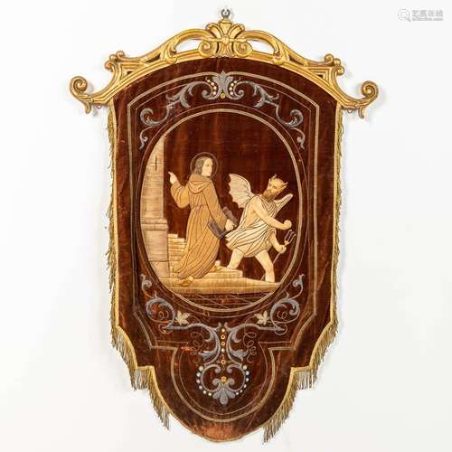 An antique gothic style banner, with giltwood support and a ...