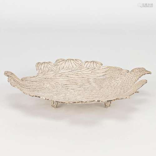 A bowl in the shape of a bird and made of filigrana silver. ...